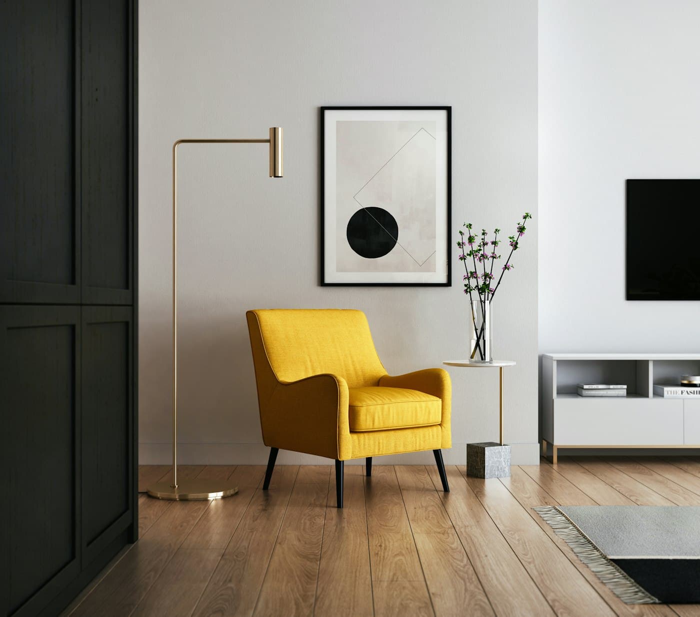 Mustard yellow armchair beside a brass floor lamp in a modern living room